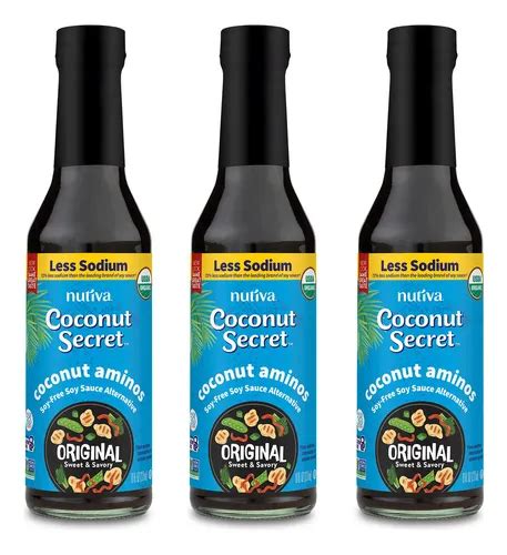 Infografía comparativa de los beneficios de Coconut Aminos frente a la salsa de soja tradicional, destacando la ausencia de fitoestrógenos y gluten en los coconut aminos.