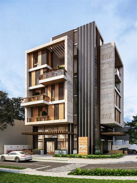 Fachada de un edificio residencial moderno con zonas verdes