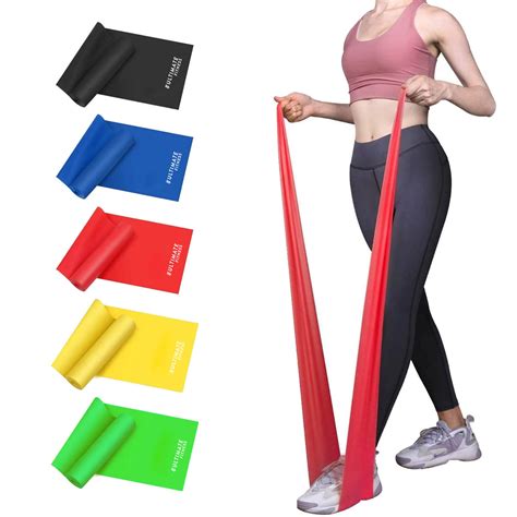 Imagen de un set de bandas elásticas de resistencia y discos de pesas.