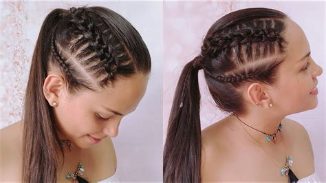 Una mujer mayor con el cabello recogido y trenzas, vistiendo ropa tradicional.