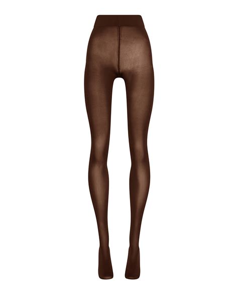 Primer plano de unos pantis opacos Wolford con detalle de efecto push-up y brillo